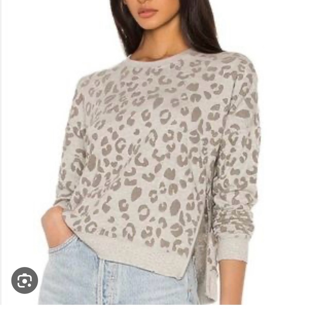 Rails sweater with zippers at side.
